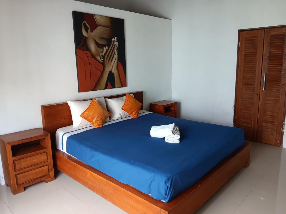 Adore Guesthouse Amed Buitenkant foto