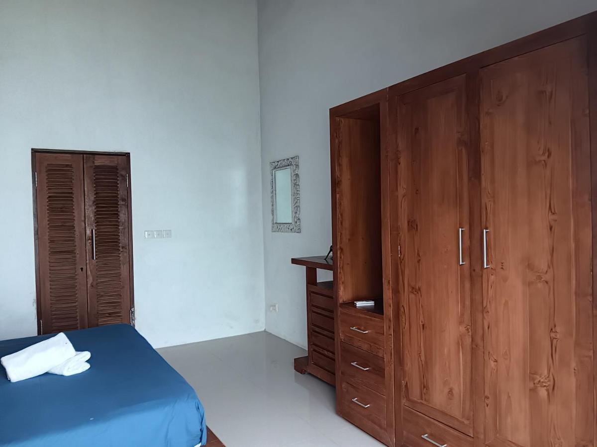 Adore Guesthouse Amed Buitenkant foto