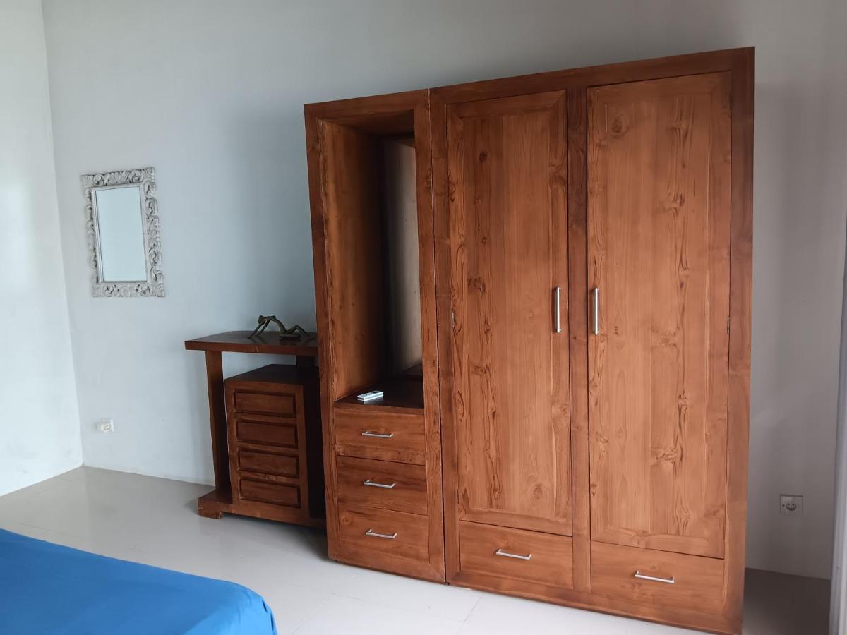 Adore Guesthouse Amed Buitenkant foto