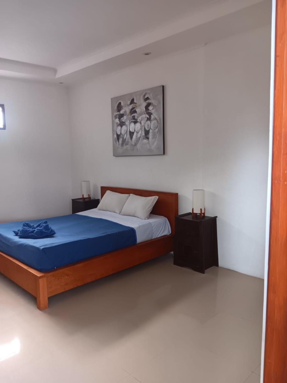 Adore Guesthouse Amed Buitenkant foto
