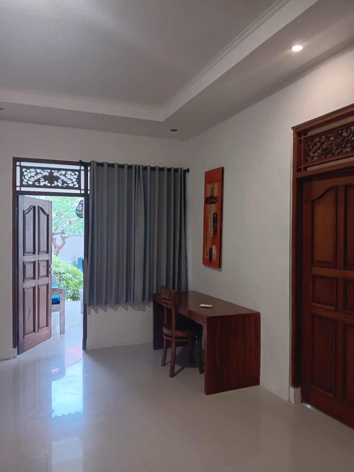 Adore Guesthouse Amed Buitenkant foto