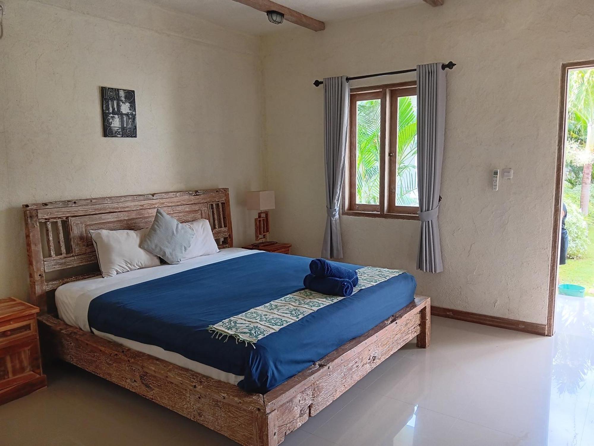 Adore Guesthouse Amed Buitenkant foto
