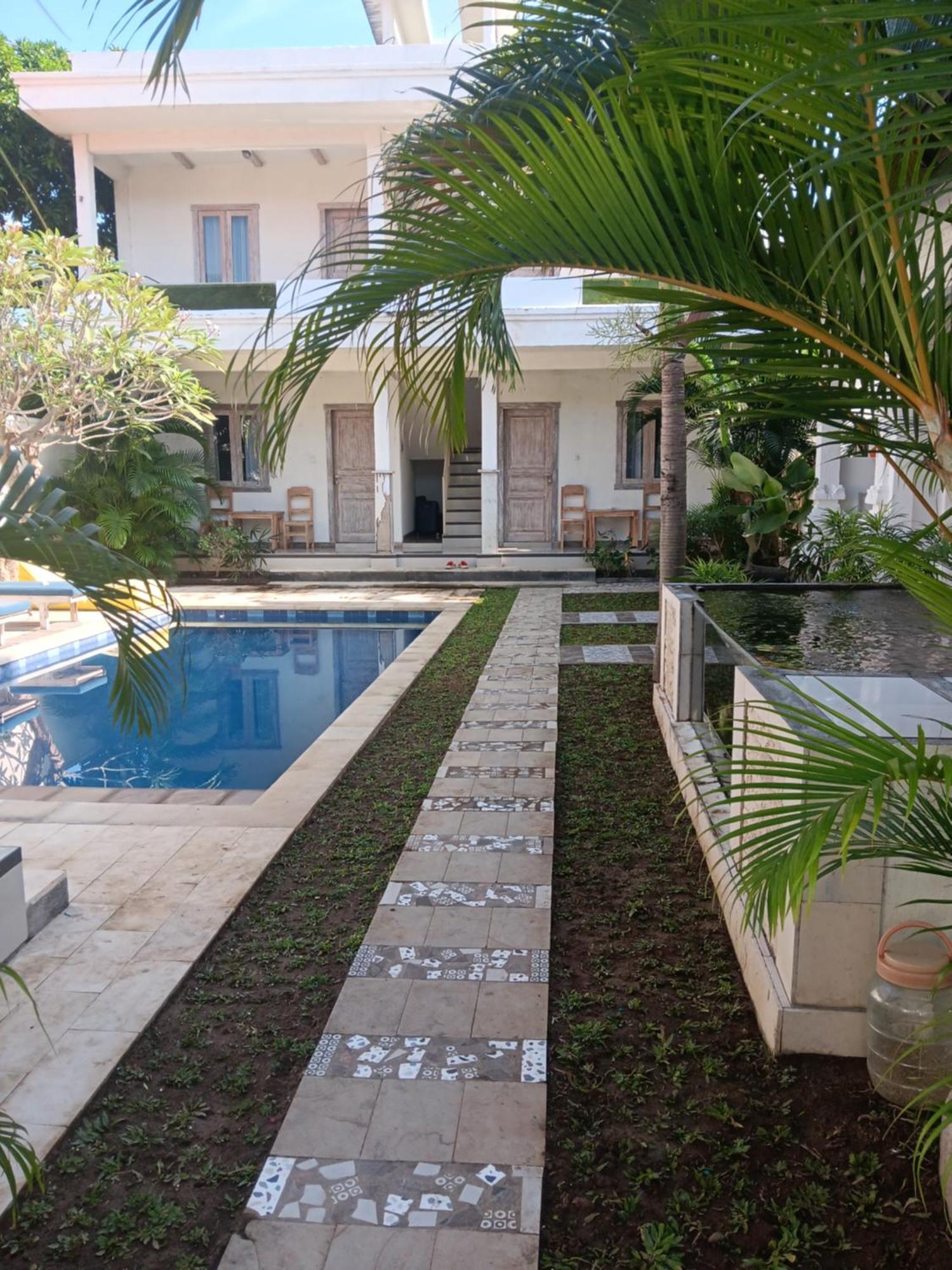 Adore Guesthouse Amed Buitenkant foto
