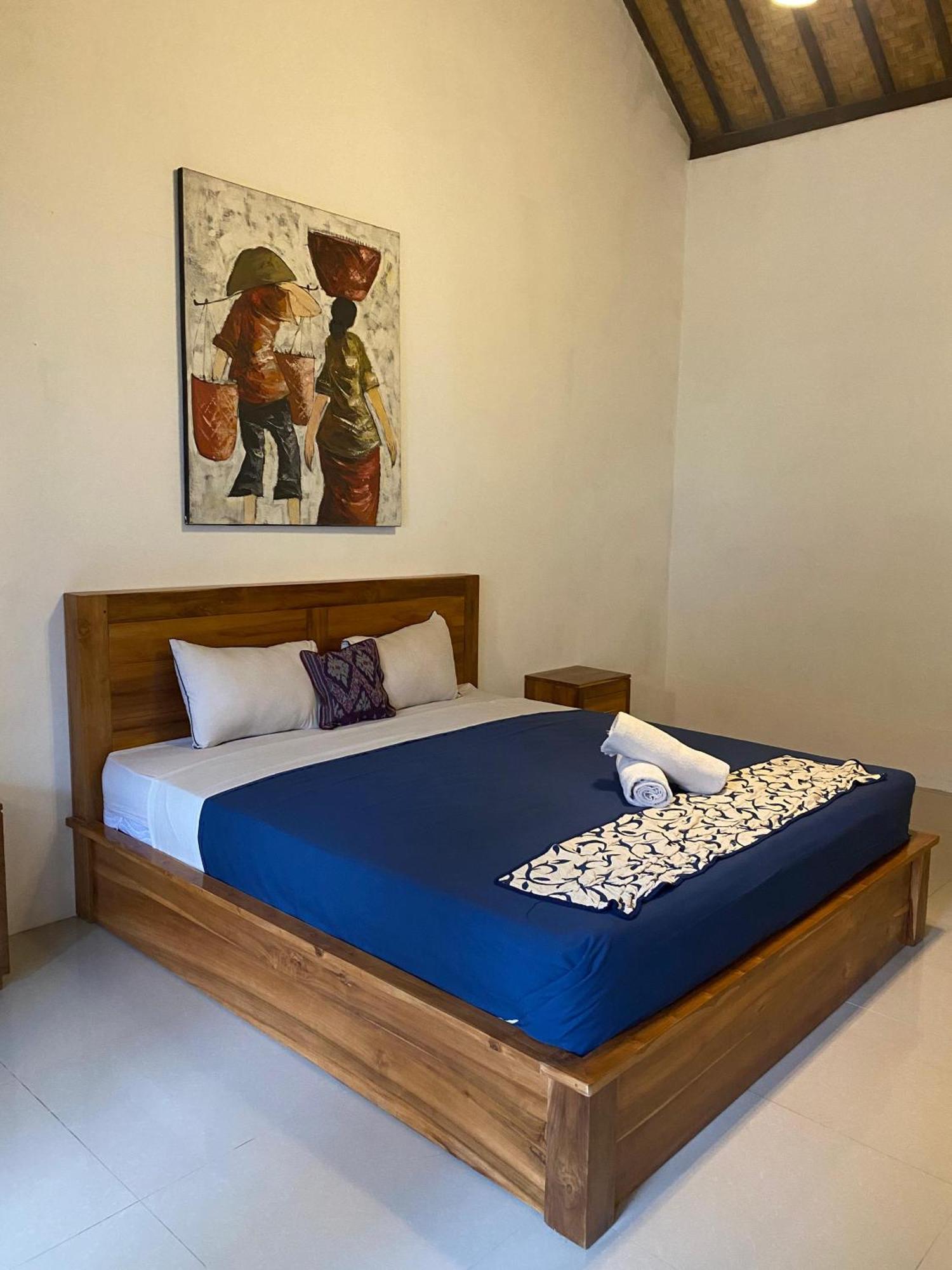 Adore Guesthouse Amed Buitenkant foto