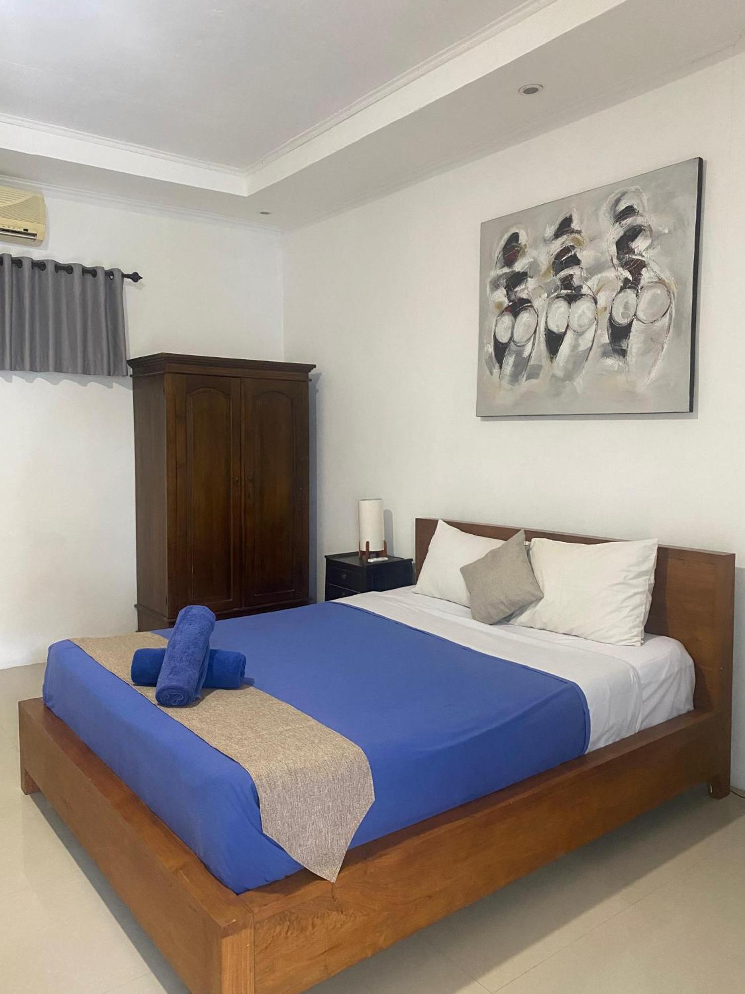 Adore Guesthouse Amed Buitenkant foto