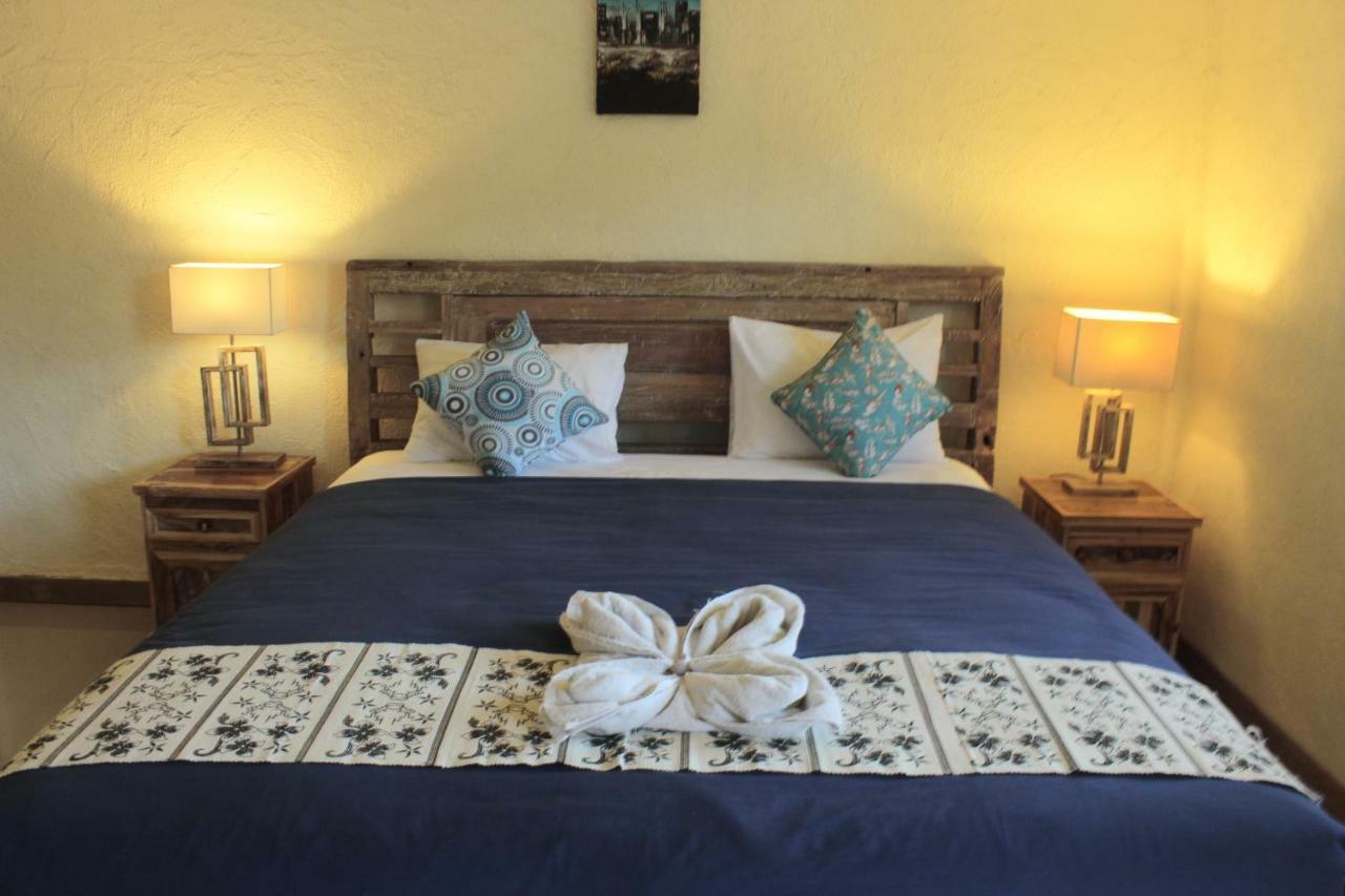 Adore Guesthouse Amed Buitenkant foto