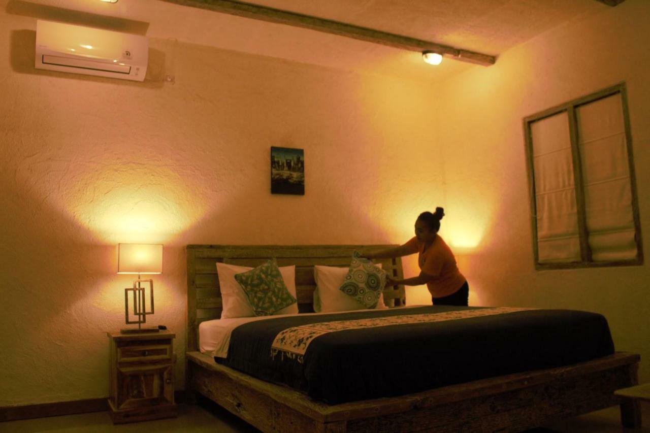 Adore Guesthouse Amed Buitenkant foto